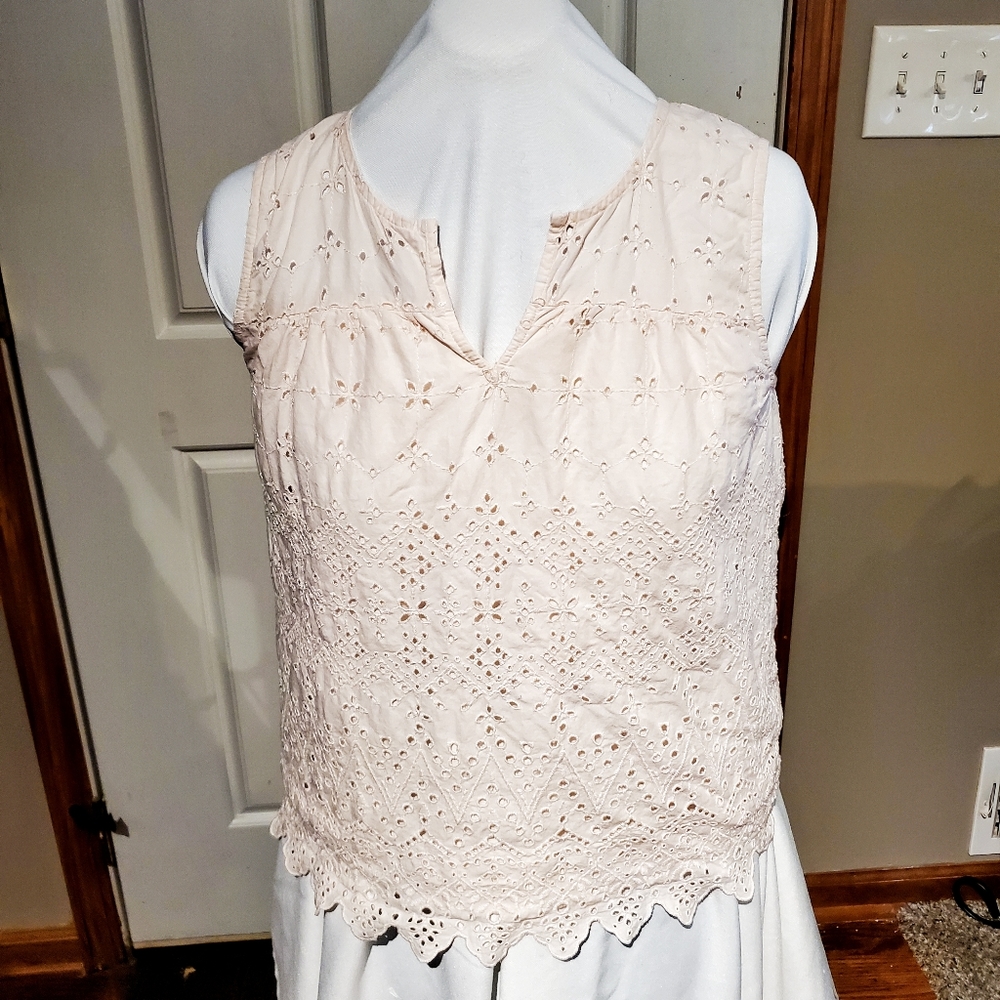 Two eyelet tops